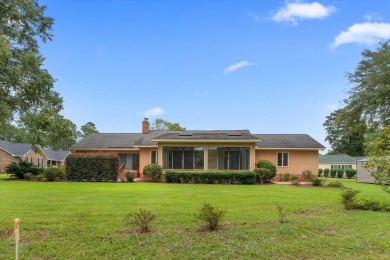 Welcome to this charming 3-bedroom, 2-bath ranch-style home on Santee-Cooper Country Club in South Carolina - for sale on GolfHomes.com, golf home, golf lot