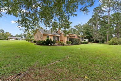 Welcome to this charming 3-bedroom, 2-bath ranch-style home on Santee-Cooper Country Club in South Carolina - for sale on GolfHomes.com, golf home, golf lot