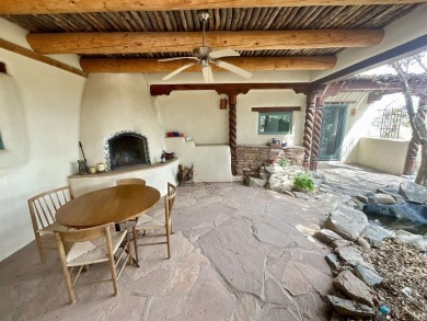 Enjoy indoor and outdoor living spaces as you take in on Taos Country Club in New Mexico - for sale on GolfHomes.com, golf home, golf lot