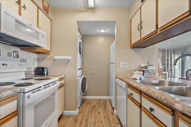In the heart of Pointe Royale, you'll find this homey condo on Pointe Royale Village Country Club in Missouri - for sale on GolfHomes.com, golf home, golf lot