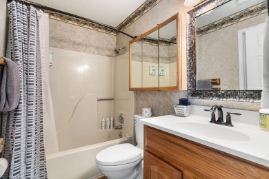 In the heart of Pointe Royale, you'll find this homey condo on Pointe Royale Village Country Club in Missouri - for sale on GolfHomes.com, golf home, golf lot