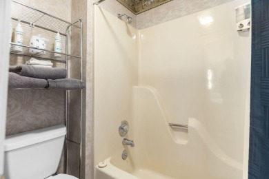 In the heart of Pointe Royale, you'll find this homey condo on Pointe Royale Village Country Club in Missouri - for sale on GolfHomes.com, golf home, golf lot