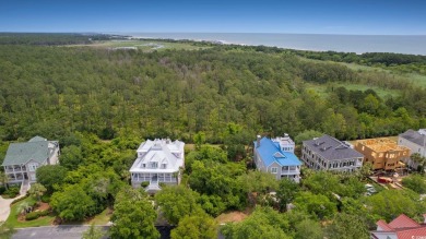 Welcome to your dream coastal retreat! Nestled just 1/3 mile on DeBordieu Country Club in South Carolina - for sale on GolfHomes.com, golf home, golf lot