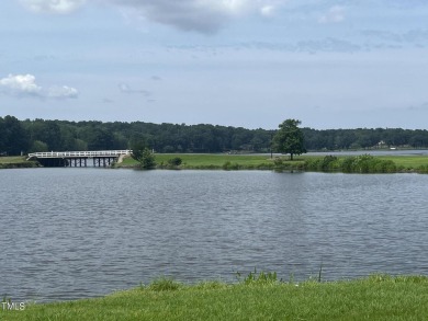 This large 0.53-acre lot in the sought-after South Landing on Carolina Trace Country Club in North Carolina - for sale on GolfHomes.com, golf home, golf lot