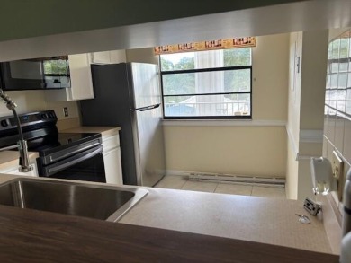 CHARMING 2ND FLOOR 2BEDROOM/2BATH CONDO  OVERLOOKING GOLFCOURSE on Bear Lakes Country Club in Florida - for sale on GolfHomes.com, golf home, golf lot