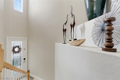 Discover refined luxury and effortless Florida living in this on Heritage Landing Golf  in Florida - for sale on GolfHomes.com, golf home, golf lot