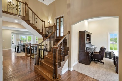 Custom home with 4 spacious bedrooms, 4.5 bathrooms nestled on on Blackstone Golf Club in Illinois - for sale on GolfHomes.com, golf home, golf lot