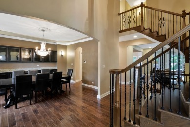 Custom home with 4 spacious bedrooms, 4.5 bathrooms nestled on on Blackstone Golf Club in Illinois - for sale on GolfHomes.com, golf home, golf lot