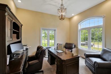 Custom home with 4 spacious bedrooms, 4.5 bathrooms nestled on on Blackstone Golf Club in Illinois - for sale on GolfHomes.com, golf home, golf lot