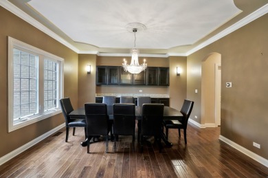 Custom home with 4 spacious bedrooms, 4.5 bathrooms nestled on on Blackstone Golf Club in Illinois - for sale on GolfHomes.com, golf home, golf lot
