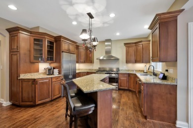 Custom home with 4 spacious bedrooms, 4.5 bathrooms nestled on on Blackstone Golf Club in Illinois - for sale on GolfHomes.com, golf home, golf lot