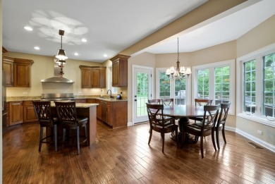 Custom home with 4 spacious bedrooms, 4.5 bathrooms nestled on on Blackstone Golf Club in Illinois - for sale on GolfHomes.com, golf home, golf lot