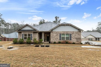Set in a desirable golf course neighborhood, this stylish on St. Andrews Golf and Country Club in Georgia - for sale on GolfHomes.com, golf home, golf lot
