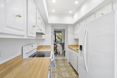 This beautiful condominium in Boca West is just steps away from on Boca West Golf and Country Club in Florida - for sale on GolfHomes.com, golf home, golf lot