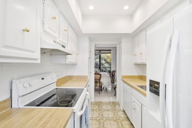 This beautiful condominium in Boca West is just steps away from on Boca West Golf and Country Club in Florida - for sale on GolfHomes.com, golf home, golf lot
