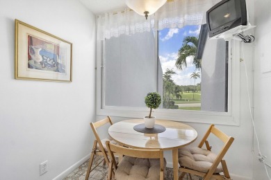 This beautiful condominium in Boca West is just steps away from on Boca West Golf and Country Club in Florida - for sale on GolfHomes.com, golf home, golf lot