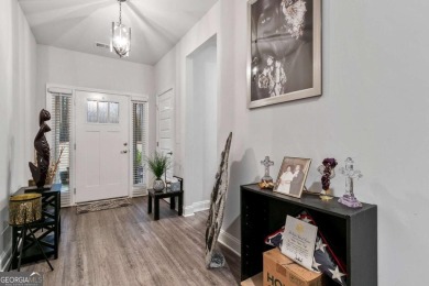 Set in a desirable golf course neighborhood, this stylish on St. Andrews Golf and Country Club in Georgia - for sale on GolfHomes.com, golf home, golf lot