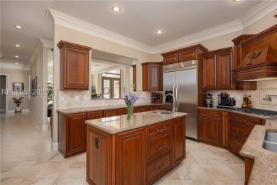 As you step inside, you're greeted by an open and airy floor on The Golf Club at Indigo Run in South Carolina - for sale on GolfHomes.com, golf home, golf lot