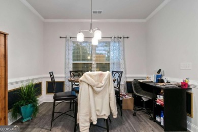 Set in a desirable golf course neighborhood, this stylish on St. Andrews Golf and Country Club in Georgia - for sale on GolfHomes.com, golf home, golf lot
