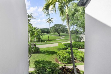 This beautiful condominium in Boca West is just steps away from on Boca West Golf and Country Club in Florida - for sale on GolfHomes.com, golf home, golf lot