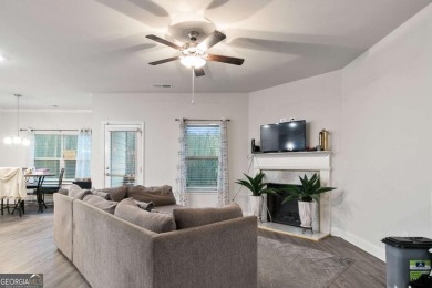 Set in a desirable golf course neighborhood, this stylish on St. Andrews Golf and Country Club in Georgia - for sale on GolfHomes.com, golf home, golf lot