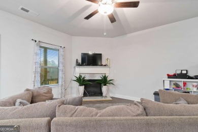 Set in a desirable golf course neighborhood, this stylish on St. Andrews Golf and Country Club in Georgia - for sale on GolfHomes.com, golf home, golf lot