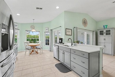 Welcome to this beautifully updated home offering inviting on Tampa Bay Golf and Country Club in Florida - for sale on GolfHomes.com, golf home, golf lot