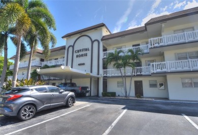 Rarely available, *investor friendly*, light & bright 2 bedroom on Crystal Lake Country Club in Florida - for sale on GolfHomes.com, golf home, golf lot
