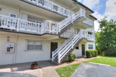 Rarely available, *investor friendly*, light & bright 2 bedroom on Crystal Lake Country Club in Florida - for sale on GolfHomes.com, golf home, golf lot