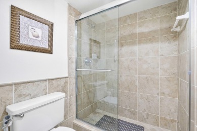This beautiful condominium in Boca West is just steps away from on Boca West Golf and Country Club in Florida - for sale on GolfHomes.com, golf home, golf lot