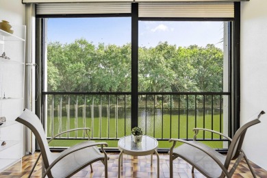 This beautiful condominium in Boca West is just steps away from on Boca West Golf and Country Club in Florida - for sale on GolfHomes.com, golf home, golf lot