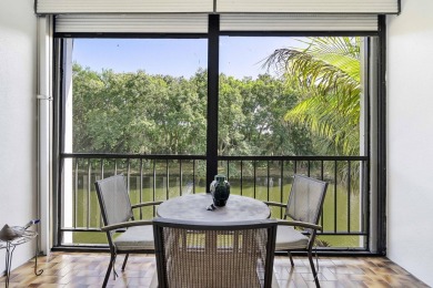 This beautiful condominium in Boca West is just steps away from on Boca West Golf and Country Club in Florida - for sale on GolfHomes.com, golf home, golf lot
