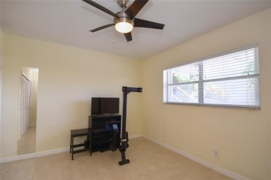 Rarely available, *investor friendly*, light & bright 2 bedroom on Crystal Lake Country Club in Florida - for sale on GolfHomes.com, golf home, golf lot
