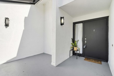 This beautiful condominium in Boca West is just steps away from on Boca West Golf and Country Club in Florida - for sale on GolfHomes.com, golf home, golf lot
