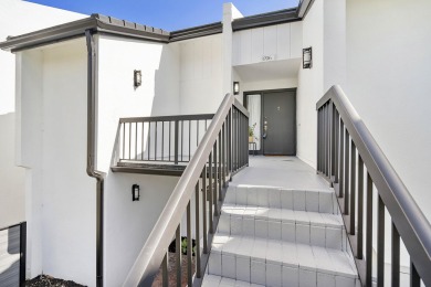 This beautiful condominium in Boca West is just steps away from on Boca West Golf and Country Club in Florida - for sale on GolfHomes.com, golf home, golf lot