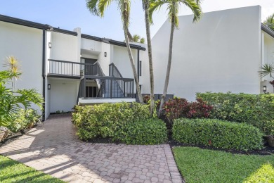 This beautiful condominium in Boca West is just steps away from on Boca West Golf and Country Club in Florida - for sale on GolfHomes.com, golf home, golf lot