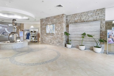 This beautiful condominium in Boca West is just steps away from on Boca West Golf and Country Club in Florida - for sale on GolfHomes.com, golf home, golf lot