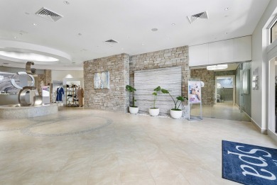 This beautiful condominium in Boca West is just steps away from on Boca West Golf and Country Club in Florida - for sale on GolfHomes.com, golf home, golf lot