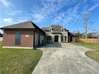 This beautiful 4 Bedroom, 3 Bath, 7 yr old home in Moss Bluff is on Pine Shadows Golf Course in Louisiana - for sale on GolfHomes.com, golf home, golf lot