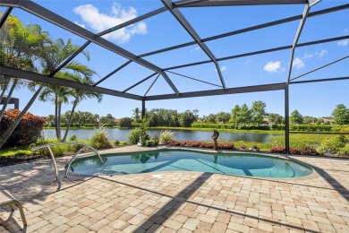 EXCEPTIONAL 2 BEDROOM + DEN, 2 BATH, 2-CAR GARAGE LAKEFRONT POOL on Riverwood Golf Club in Florida - for sale on GolfHomes.com, golf home, golf lot