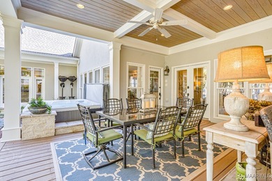 Nestled among mature trees and overlooking Wynlakes Golf Course on Wynlakes Golf and Country Club in Alabama - for sale on GolfHomes.com, golf home, golf lot