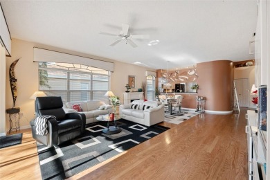 Welcome to this charming 3-bedroom, 2-bathroom WATERFRONT home on East Lake Woodlands Country Club in Florida - for sale on GolfHomes.com, golf home, golf lot