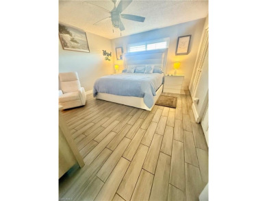 Welcome to this stunning corner unit located on the first floor on LaPlaya Golf Club in Florida - for sale on GolfHomes.com, golf home, golf lot