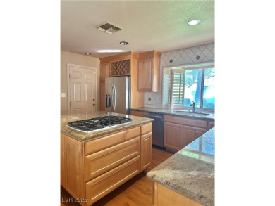 Stop your search, and welcome this stunning single story on Spanish Trail Golf and Country Club in Nevada - for sale on GolfHomes.com, golf home, golf lot