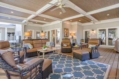 Nestled among mature trees and overlooking Wynlakes Golf Course on Wynlakes Golf and Country Club in Alabama - for sale on GolfHomes.com, golf home, golf lot