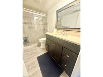 Welcome to this stunning corner unit located on the first floor on LaPlaya Golf Club in Florida - for sale on GolfHomes.com, golf home, golf lot