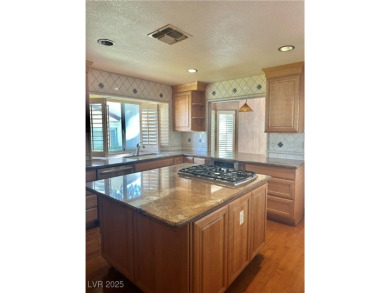 Stop your search, and welcome this stunning single story on Spanish Trail Golf and Country Club in Nevada - for sale on GolfHomes.com, golf home, golf lot