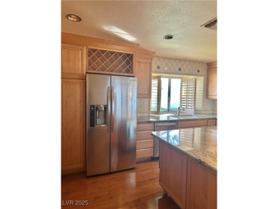 Stop your search, and welcome this stunning single story on Spanish Trail Golf and Country Club in Nevada - for sale on GolfHomes.com, golf home, golf lot