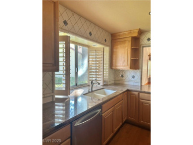 Stop your search, and welcome this stunning single story on Spanish Trail Golf and Country Club in Nevada - for sale on GolfHomes.com, golf home, golf lot