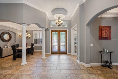 Welcome home to an enviable Florida life in one of SW Orlando's on The Golden Bear Club At Keenes Pointe in Florida - for sale on GolfHomes.com, golf home, golf lot